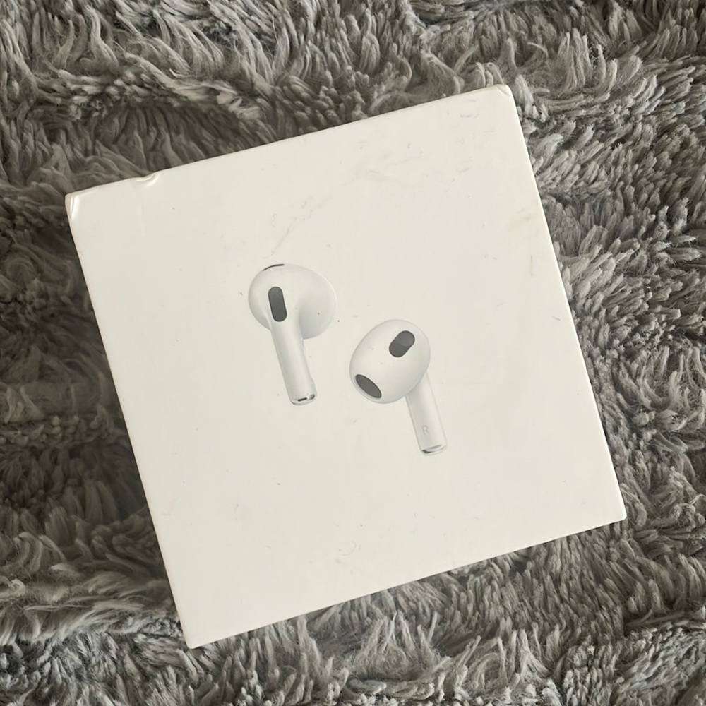 BRAND NEW UNOPENED AIRPODS with lightning charging case
